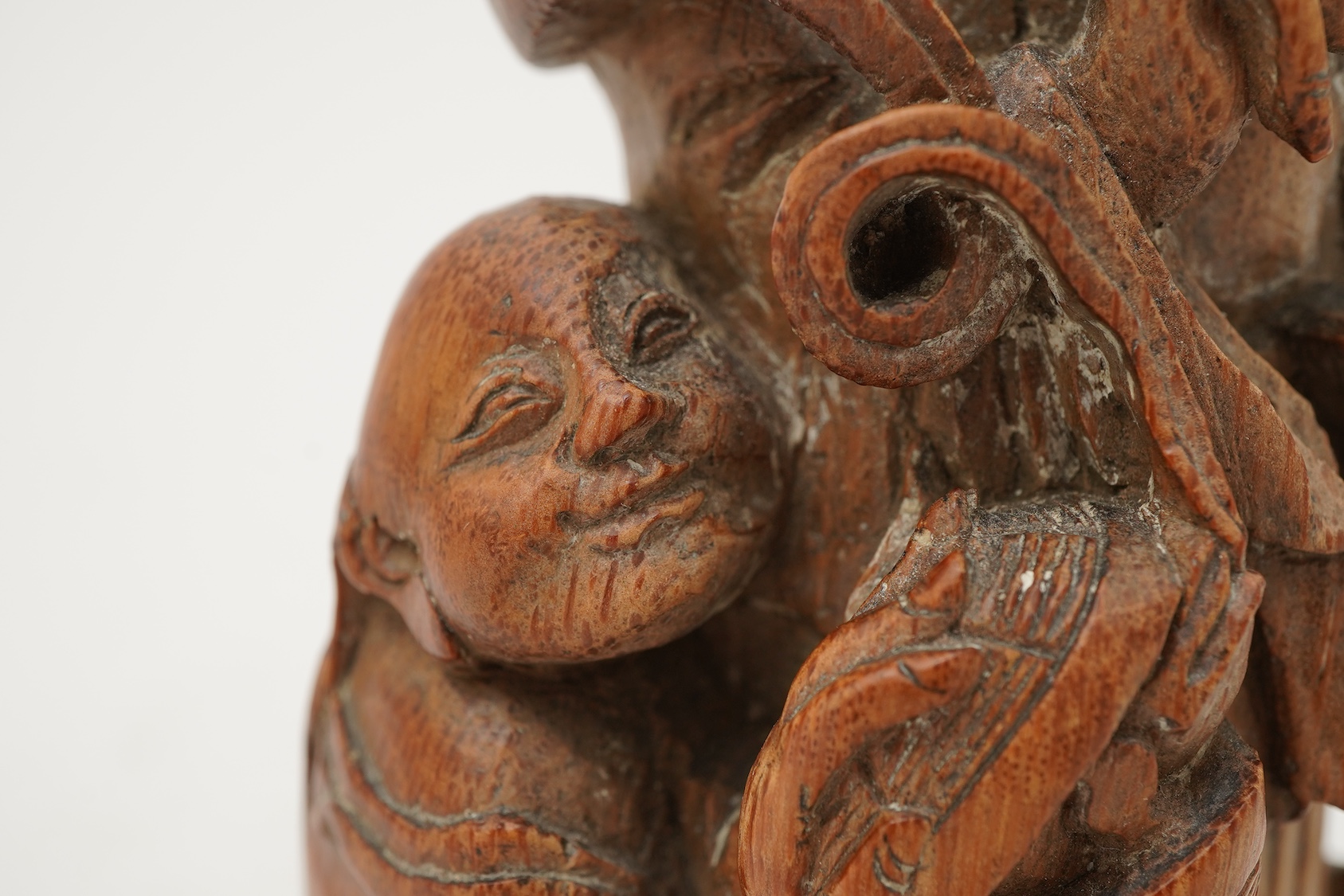 A Chinese carved bamboo group of the He He Erxian, 19th century
